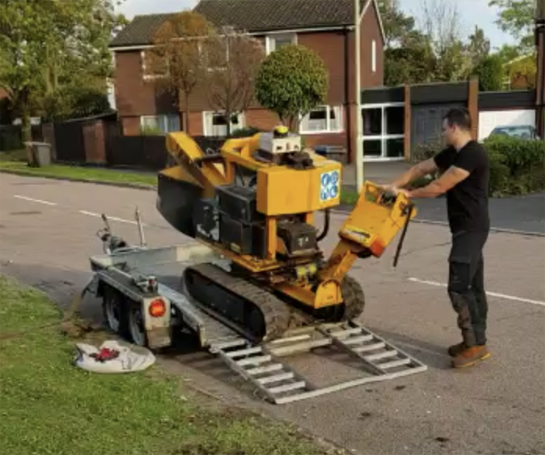 tree stump remover coming off trailer St Albans